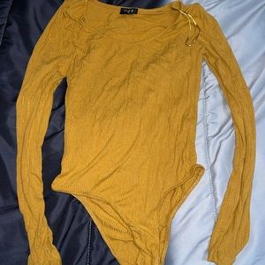 LONG SLEEVES BODY SUIT.